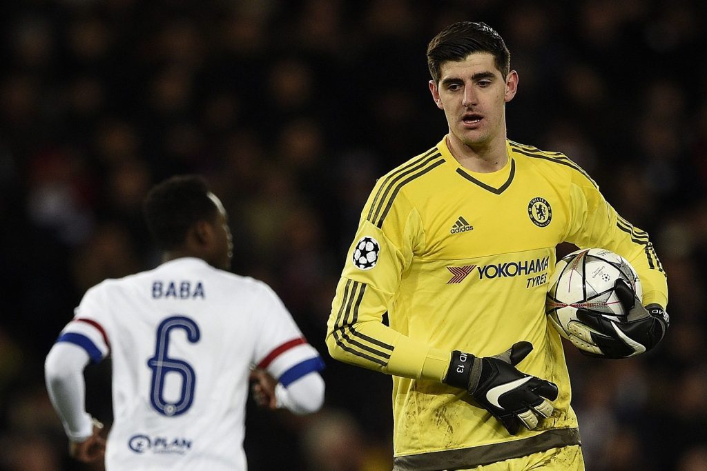 Chelsea's Belgian goalkeeper Thibaut Courtois (R) holds the ball next to Chelsea's Ghanaian defender Abdul Rahman Baba during the Champions League round of 16 first leg football match between Paris Saint-Germain (PSG) and Chelsea FC on February 16, 2016, at the Parc des Princes stadium in Paris. AFP PHOTO / FRANCK FIFE / AFP / FRANCK FIFE (Photo credit should read FRANCK FIFE/AFP/Getty Images)